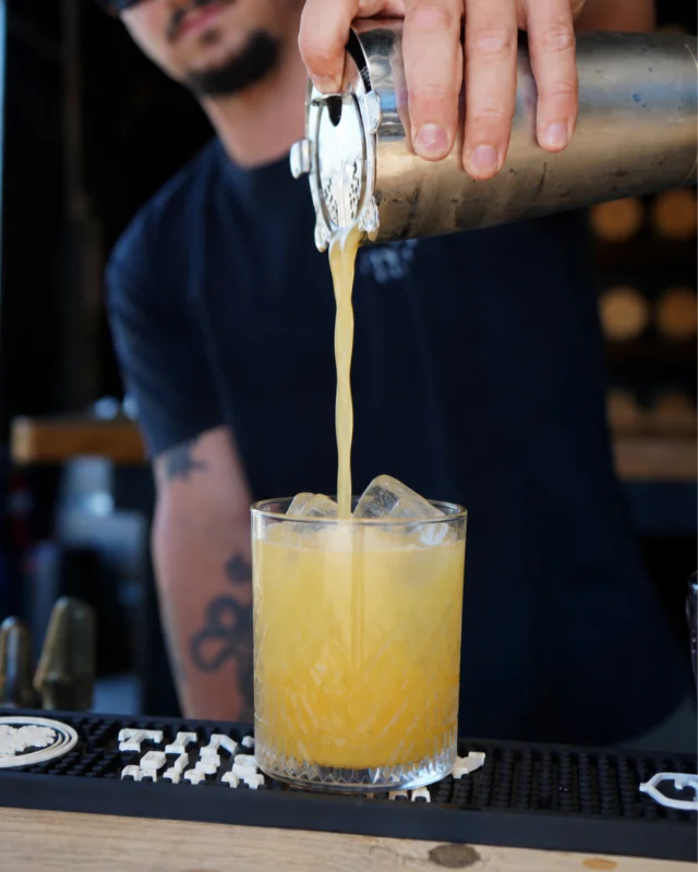 A little sweet. A little citrus. A whole lot of rye. 🍯🥃⁠
⁠
Meet the Tin City Honey Bear—crafted with Tin City Premium Rye, fresh lemon juice, and local honey, then topped with a dehydrated lemon wheel and our signature honey bear lollipop.